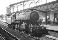 One of Kingmoor shed's Ivatt 4MT 2-6-0s no 43103 idles alongside platform 1 at Carlisle in the summer of 1963. Affectionately referred to as <I>'Flying Pigs'</I> by some enthusiasts, an example of the class is now preserved on the Severn Valley Railway [see image 25291].<br><br>[K A Gray 03/08/1963]