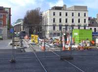 Construction of on an extension to Dublins Luas Green Line to Broombridge in the north west of the city.  The route will bisect the Red Line and run northwards along O'Connell Street and southwards along  parallel Marlborough Street crossing the Liffey on a new bridge, seen here on 22 March 2014 with track in place. [Ref query 6451]<br><br>[Bill Roberton 22/03/2014]
