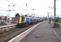 The 10.30 from Glasgow Central, formed by 380002, arrives at Ayr platform 1 on 25 April 2014.<br><br>[Colin Miller 25/04/2014]
