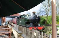 Scene on the Swindon and Cricklade Railway on 26 April 2014 with ex-GWR 0-6-2T no 5637, currently on loan from the East Somerset Railway, departing with a train for Taw Valley Halt.<br><br>[Peter Todd 26/04/2014]