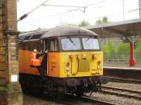 Colas Rail 56094 seen during a quick driver change at Crewe station whilst returning from Rolls-Royce at Sinfin, Derby, to the Ineos refinery at Grangemouth, with empty aviation fuel bogie tanks. <br><br>[David Pesterfield 01/05/2014]