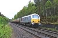 DBS 67026 <I>Diamond Jubilee</I> approaches Carrbridge on 10 May with a railtour for Inverness.<br><br>[John Gray 10/05/2014]