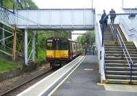 A Cathcart Circle train leaves Mount Florida southbound on 15 May 2014. <br><br>[Veronica Clibbery 15/04/2014]