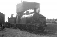Scene in the yard at Silloth on 13 June 1964 as CR123 is serviced following its arrival with the RCTS <I>Solway Ranger</I>. The locomotive had brought the special on the leg from Carlisle together with GNSR No 49 <I>Gordon Highlander</I> [see image 39700]. Silloth shed had been officially closed by BR in July 1953. <br><br>[K A Gray 13/06/1964]