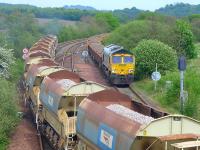 DBS 66188 passes Freightliner 66622 at Inverkeithing East Junction on 18 May with ballasts to/from Millerhill and Stirling via Cowdenbeath and Alloa.<br><br>[Bill Roberton 18/05/2014]