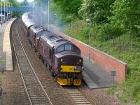 37516 and 37685 charge through Dalgety Bay on 18 May with <I>The Royal Scotsman</I> from Edinburgh to Ardgay.<br><br>[Bill Roberton 18/05/2014]