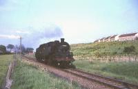Standard class 4 2-6-4 tanks 80046+80060 between East Kilbride and Hairmyres on 3 June 1965 returning light engine to Glasgow. <br><br>[G W Robin 03/06/1965]
