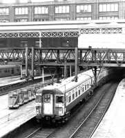 An early afternoon Clacton line service preparing to leave Liverpool Street on 25 April 1972. <I>Clacton Express</I> EMU 309621, built at York in 1962 (originally as class AM9) still has its distinctive wrap-around cab windows at this time.<br><br>[John Furnevel 25/04/1972]
