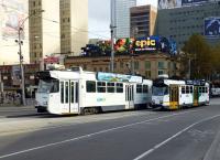 A Z Class and an A Class tram pass at the junction of St. Kilda Road / Swanston Street and Flinders Street, Melbourne on 11 May 2013. Just off to left is Flinders Street Station.<br><br>[Colin Miller 11/05/2013]
