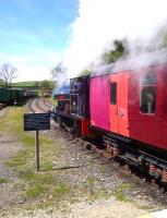 <h4><a href='/locations/K/Kirkby_Stephen_East'>Kirkby Stephen East</a></h4><p><small><a href='/companies/S/South_Durham_and_Lancashire_Union_Railway'>South Durham and Lancashire Union Railway</a></small></p><p>Not every day you see the original SDLUR '<I>plum, mandarin, and raspberry</I>' coach livery. Peckett no. 2084 see image <a href='/img/44/743/index.html'>44743</a> makes an enthusiastic departure from the recently lengthened platforms at Kirkby Stephens 'other' station. 7/19</p><p>17/05/2014<br><small><a href='/contributors/Ken_Strachan'>Ken Strachan</a></small></p>