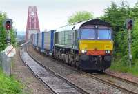 DRS 66301 with the 4D47 Inverness - Mossend Intermodal, diverted through Fife due to engineering work in the Larbert area, seen approaching Dalmeny on 1 June 2014. <br><br>[Bill Roberton 01/06/2014]