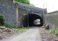 The north portal of Ladhope Tunnel on 9 June 2014, looking along Ladhope Vale towards the new station site. The modifications to raise the bridge parapet and side wall look to have been carried out in a sympathetic manner. [See image 41707]<br><br>[John Furnevel 09/06/2014]