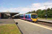 TransPennine 185120 departs from Barrow-in-Furness on 14 June 2014 with a service to Manchester Airport.<br><br>[John McIntyre 14/06/2014]