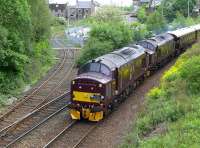 37685 and 37516 drop down past Inverkeithing South Junctionon 26 May  with <I>The Royal Scotsman</I> from Edinburgh to Keith. The Rosyth Dockyard branch diverges to the left.<br><br>[Bill Roberton 26/05/2014]