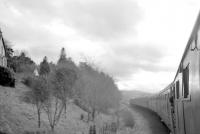 BR Grand Scottish Tour no 1 south of Grantown-on-Spey on 25 March 1967 on the leg from Aberdeen to Aviemore via Keith and Dufftown. The pair of Type 2s on the front of the train would be supplemented by a third at Aviemore for the journey to Perth [see image 41311]. [Ref query 6543]<br><br>[Bruce McCartney 25/03/1967]