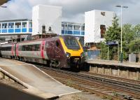 The four tracks at Brockenhurst serve two island platforms, only accessible by footbridges. Major work to install lifts was underway on 25 May 2014 as Voyager 220010 called on a service from Bournemouth heading for Manchester. <br><br>[Mark Bartlett 25/05/2014]