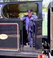 This chap seems to be quite happy driving a steam engine on the Stainmore line [see image 47625]. Wouldn't you be?<br><br>[Ken Strachan 17/05/2014]