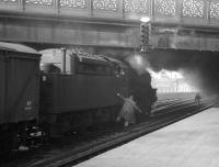 An unidentified Black 5 stands in the west sidings at Carlisle station with a freight, thought to have been photographed on 7 March 1964. The locomotive was one of four examples of the class equipped with self weighing tenders (of which 45081 was allocated to Kingmoor shed at that time). [With thanks to Bill Jamieson]   <br><br>[K A Gray 07/03/1964]