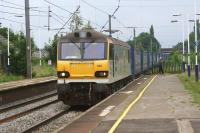 92030 speeds north past Leyland with the Daventry to Mossend Tesco cntainers on 28 June 2014.<br><br>[John McIntyre 28/06/2014]