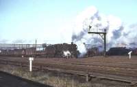 A southbound freight pulls away from Upperby yard, Carlisle, on 28 November 1964 hauled by Warrington (Dallam) based Jubilee no 45655 <I>Keith</I>.<br><br>[John Robin 28/11/1964]