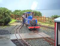 The downpour of rain has ended and the sun is threatening to break through at Craignure in August 2011 as 2-6-2T locomotive <I>Victoria</I> prepares to run round her train. She had just been turned following arrival from Torosay. The driver that day was from Statfold Barn. <br>
<br><br>[Andrew Wilson 24/08/2011]