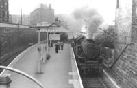 A Cathcart Circle train calls at Queens Park in the early 1960s behind a Fairburn 2-6-4 tank.<br><br>[David Stewart //]