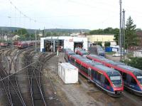Morning scene at Aachen depot on 24th June, with Euregiobahn units in the foreground and a variety of DB stock elsewhere on the site. Aachen (Aix-la-Chapelle) is just a few miles from Germany's borders with Belgium and the Netherlands, and is a key junction for inter-regional passenger services and international freight operations.<br><br>[David Spaven 24/06/2014]