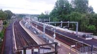 View south over the fully electrified Springburn Station on 12 July 2014.<br><br>[Colin Harkins 12/07/2014]