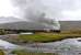 <I>The Highlands and Islands Explorer</I> photographed west of Achnasheen on Sunday 11 May, with the rain continuing to sheet down. Black Five No.45407 is leaving for Kyle of Lochalsh after a water stop.<br><br>[John Gray 11/05/2014]