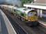 Freightliner 66622 climbs through North Queensferry on 26 May with Aberdeen - Oxwellmains cement empties.<br><br>[Bill Roberton 26/05/2014]