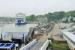 Lymington Pier station, as seen from the ferry <I>Wight Sky</I> arriving from Yarmouth. The ferries no longer berth alongside the rail station [See image 33517] but it is still only a very short walk from the ship to the platform. Spare ferry <I>Wight Sun</I> is moored beyond the station, near the rail bridge. <br><br>[Mark Bartlett 20/05/2014]