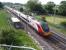 The 15.47 Liverpool Lime Street - London Euston Pendolino near Blisworth, Northants, on 24 June 2014.<br><br>[John Steven 24/06/2014]