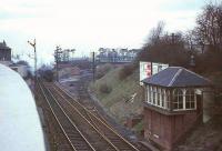 An evening train bound for East Kilbride approaches Clarkston in April 1966, the last week of steam operations on the route. Photographed from the roof car park of Clarkston Toll shopping centre on Busby Road, much of which was destroyed in a major gas explosion five and a half years later, in which 21 people died.<br><br>[John Robin /04/1966]