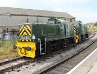 <I>Celebrity</I> Class 14 D9555, the last BR loco built at Swindon works is usually based on the Dean Forest Railway. It ran coupled to D9520 from the Nene Valley on several round trips at the ELR <I>Class 14s @ 50</I> gala on 26th July. The two locos, in smart BR Green livery, are seen running round at Heywood. D9520 ran with a variety of <I>lost loco</I> identities that day including D9544 and D9547 amongst others. <br><br>[Mark Bartlett 26/07/2014]