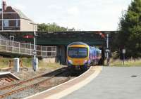 First TransPennine 185139 departs Barrow for Manchester Airport on a sunny 7th July 2014.<br><br>[Colin McDonald 07/07/2014]