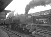 46241 <I>City of Edinburgh</I> stands on the centre road at Carlisle on 25 July 1964. The Pacific is waiting to relieve the incoming locomotive off the 9am Perth - Euston.<br><br>[K A Gray 25/07/1964]