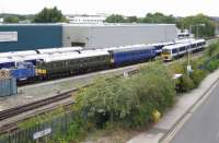 The scene at Chiltern Railways' Aylesbury depot on 15 August 2014 shows a contrast in operational DMU styles, with a 24 year old Class 165 Turbo unit in the company of two 54 year old Class 121 'Bubble Car' units. All are available for service with either 55020 or 55034 used on weekday peak hour Aylesbury to Princes Risborough shuttles.  The diesel shunter is 01509 <I>Lesley</I> (RH 468043).<br><br>[Malcolm Chattwood 15/08/2014]