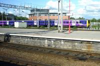 A Northern rail 323 EMU departing from Crewe on 23 August with the 16.34 service to Manchester Piccadilly.<br><br>[John Steven 23/08/2014]