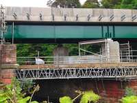 Close up section of the upgraded bridge over the Gala Water on 3 September 2014, showing detail of the raised deck and protruding steel supports which will carry the pedestrian walkway alongside. [See image 28553]<br><br>[Bruce McCartney 03/09/2014]