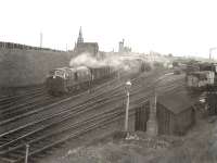 An unidentified NBL Type 2 leaving Fraserburgh in 1962 with a mixed train for Aberdeen.  <br><br>[G H Robin collection by courtesy of the Mitchell Library, Glasgow //1962]
