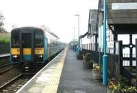 A 3-car train led by 153304 arrives at Gargrave on a Carlisle - Leeds working on 4 November 2004.<br><br>[John Furnevel 04/11/2004]