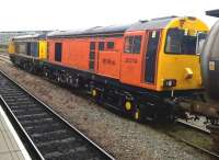 You know when you've been Tangoed: Harry Needle's bright orange 20314 [see image 36456 for a previous livery] poses next to GBRf 20901 behind Derby station on 13 September, the day of the Etches Park Open Day.<br><br>[Ken Strachan 13/09/2014]