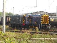 Class 08 Shunters 08507 and D3871 (08704) stabled by the Riviera Trains carriage sidings at the south end of Crewe station, with the former diesel depot visible in the background.<br><br>[David Pesterfield 30/09/2014]