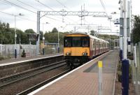 Electric Multiple Unit 318266 on a driver training run at Mount Vernon on 2 October.<br><br>[Colin McDonald 02/10/2014]
