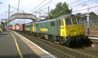 Freightliner class 86s, 86613 + 86639 with 4M74 Coatbridge to Crewe Basford Hall intermodal passing south through Carluke station on 4 September 2014.<br><br>[Ken Browne 04/09/2104]