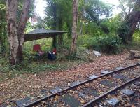 Basic temporary facilities for the blockman at Delph controlling access to and from the station and the single line to Beconsall during the West Lancashire Light Railway Gala on 5 October 2014. The chair was surprisingly comfortable...<br><br>[John McIntyre 05/10/2014]
