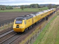 The New Measurement Train heading west towards Linlithgow at Park Farm on 6 October.<br><br>[Bill Roberton 06/10/2014]