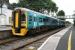 The 1215 arrival from Birmingham International prepares to depart Harlech as the 1226 return on 9th July 2014. The shuttle service is a result of the Cambrian Coast Line being currently closed from Harlech to Pwllheli. [See image 48008]<br><br>[Colin McDonald 09/07/2014]