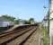 Arriva Trains Wales 175003 leaves Valley station some 12 minutes late on the 14.00 service to Holyhead, ex Cardiff Central, on 23 July 2014.<br><br>[David Pesterfield 23/07/2014]