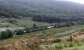 Just south of Glen Douglas a freight train for the Lochaber Smelter heads north through Glen Culanach. This glen is high above Loch long and to the south of the NATO depot. The lineside is treelined and further planting can be seen to the left of the locomotive.<br><br>[Ewan Crawford 16/08/2014]